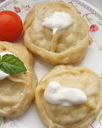 Манты со свининой и картофелем