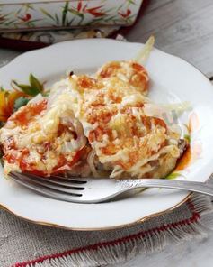 Мясо по-французски с сыром и помидорами в духовке