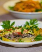 Мясо свинины по-французски с помидорами картошкой сыром