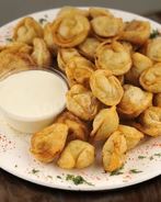 Замороженные жареные пельмени