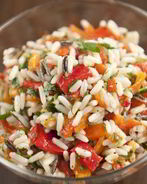 Пилаф с тыквой, красными перцами и жареными тыквенными семечками