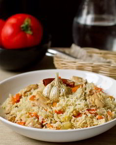 Плов из курицы с нутом и изюмом