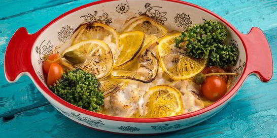 Пагр, запеченный с апельсинами