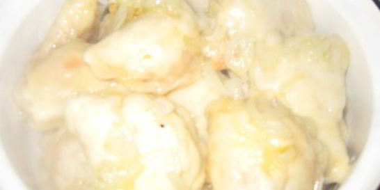 Вареники с тушеной капустой в томате