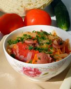 Солянка из капусты с сосисками в мультиварке