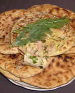 Лепешки с брынзой, сыром, ветчиной и зеленью