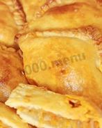 Пирожки из слоеного теста с капустой в духовке